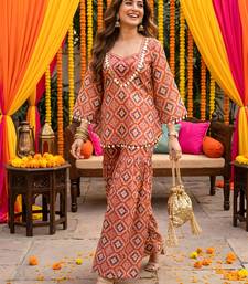 Brick red geometric print kurti crop-top sharara set