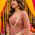 Brick red geometric print kurti crop-top sharara set