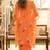 Orange lotus crop-top and draped skirt co-ord set