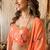 Orange lotus crop-top and draped skirt co-ord set