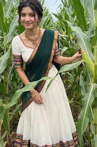 Festive Off-White Cotton Lehenga Choli Set with Dark Green Zari Border Dupatta