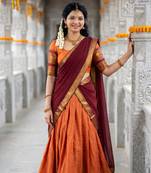 Women’s Orange and Maroon Traditional Half Saree Lehenga with Golden Woven Border