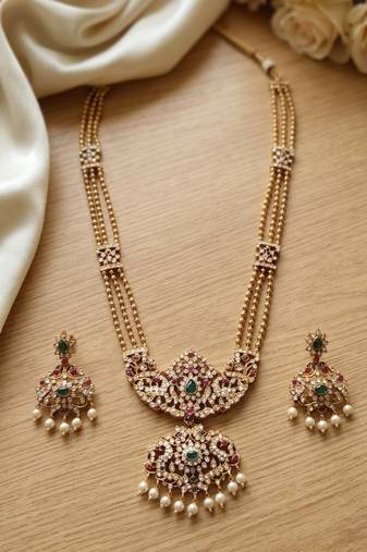 Gold plated kundan necklace set with green gems & pearls | traditional bollywood bridal wedding jewelry