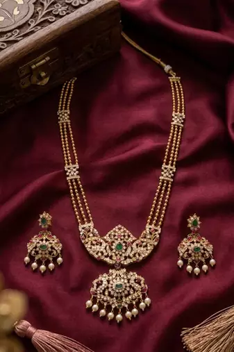 Gold plated kundan necklace set with green gems & pearls | traditional bollywood bridal wedding jewelry