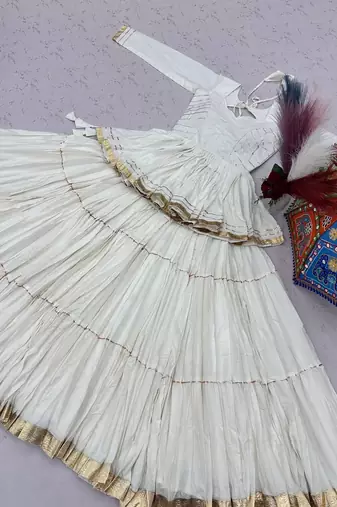 NAVRATRI WEAR WHITE COLOR COTTON SOLID LACE BORDER FLARED FREE SIZE STITCH LEHENGA & COTTON BLOUSE FULL STITCHED