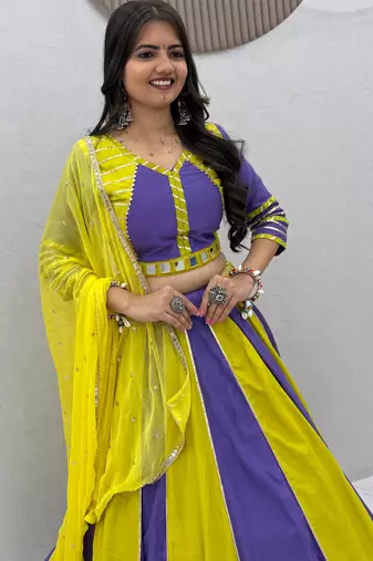 NAVRATRI WEAR YELLOW-PURPLE COLOR SOLID FLARED FREE SIZE STITCH LEHENGA SET FULL STITCHED