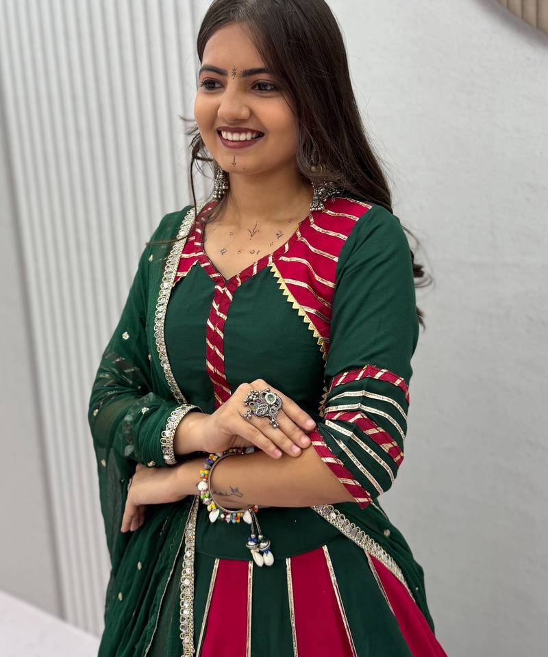NAVRATRI RANI-GREEN SOLID FLARED LEHENGA WITH COTTON HANDWORK BLOUSE DUPATTA
