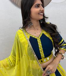 NAVRATRI YELLOW-TEAL BLUE SOLID FLARED LEHENGA SET