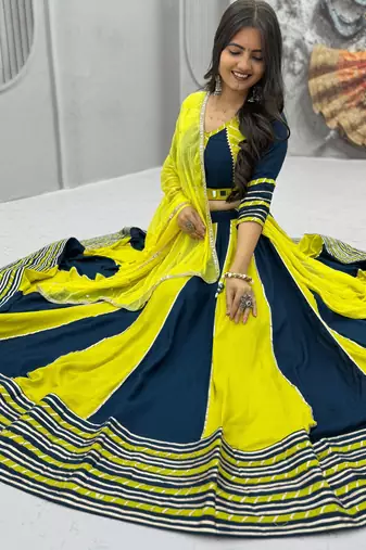 NAVRATRI YELLOW-TEAL BLUE SOLID FLARED LEHENGA SET