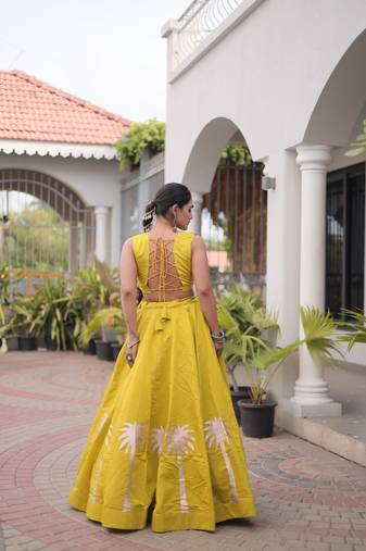 NAVRATRI WEAR PERROTT YELLOW COLOR ROMAN SILK BLEND GOTA WORK FREE SIZE LEHENGA EMBROIDERED BLOUSE FULL-STITCHED.