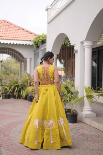 NAVRATRI WEAR PERROTT YELLOW COLOR ROMAN SILK BLEND GOTA WORK FREE SIZE LEHENGA EMBROIDERED BLOUSE FULL-STITCHED.