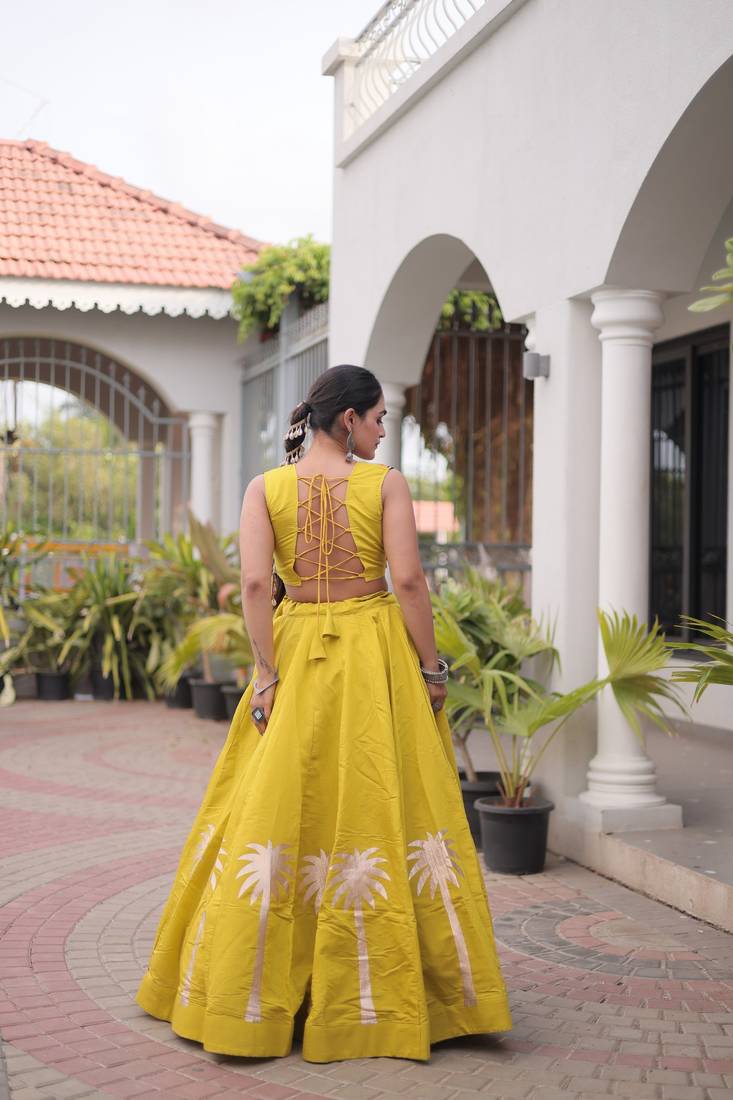 NAVRATRI WEAR PERROTT YELLOW COLOR ROMAN SILK BLEND GOTA WORK FREE SIZE LEHENGA EMBROIDERED BLOUSE FULL-STITCHED.