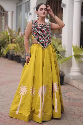 NAVRATRI WEAR PERROTT YELLOW COLOR ROMAN SILK BLEND GOTA WORK FREE SIZE LEHENGA EMBROIDERED BLOUSE FULL-STITCHED.