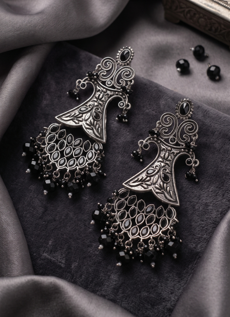 Oxidized silver-tone statement chandelier earrings with black stone accents