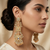 Antique gold kundan polki long jhumka earrings with yellow beads & pearl drops