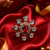 Ruby Glow Gold Finish Adjustable Ring
