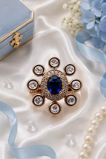 Sapphire glow gold finish adjustable ring