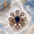 Sapphire glow gold finish adjustable ring