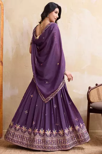 Purple Sequins Embroidered Georgette A Line Bridal Lehenga Choli with Dupatta