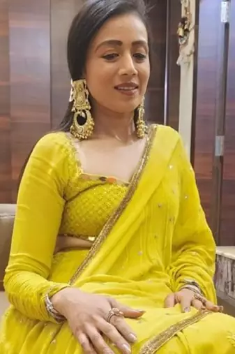 Matsya gold long jhumka earrings