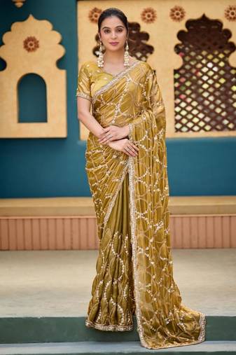 Ethnic mustard yellow sequin cutdana jaal embroidery satin saree with unstitched blouse