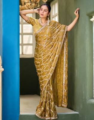 Ethnic mustard yellow sequin cutdana jaal embroidery satin saree with unstitched blouse 3