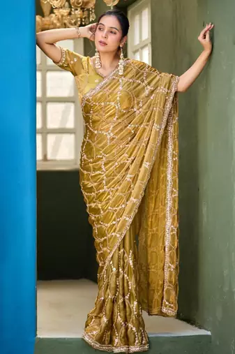 Ethnic mustard yellow sequin cutdana jaal embroidery satin saree with unstitched blouse