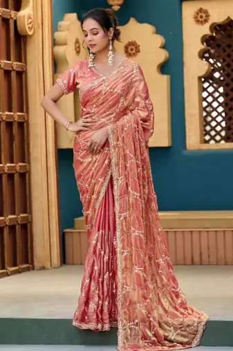 Trendy peach pink sequin cutdana jaal embroidery satin saree with unstitched blouse