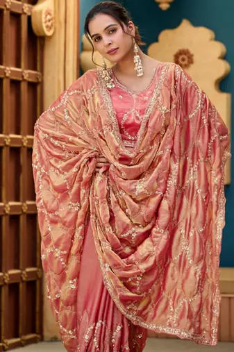 Trendy peach pink sequin cutdana jaal embroidery satin saree with unstitched blouse