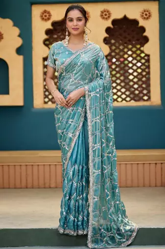 Indian teal blue sequin cutdana jaal embroidery satin saree with unstitched blouse