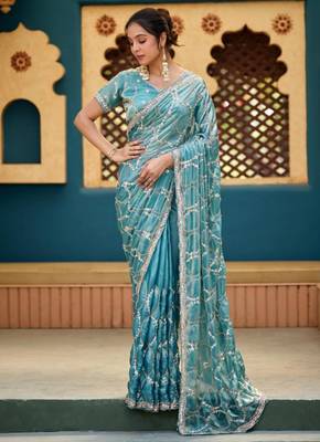Indian teal blue sequin cutdana jaal embroidery satin saree with unstitched blouse 2