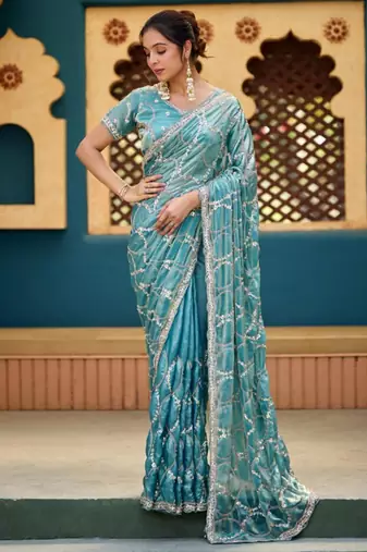 Indian teal blue sequin cutdana jaal embroidery satin saree with unstitched blouse