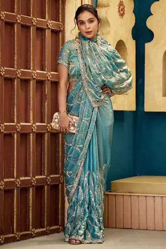 Indian teal blue sequin cutdana jaal embroidery satin saree with unstitched blouse