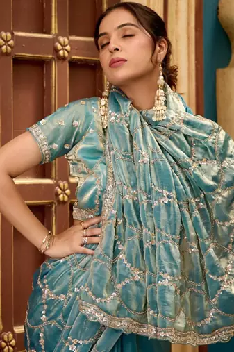 Indian teal blue sequin cutdana jaal embroidery satin saree with unstitched blouse