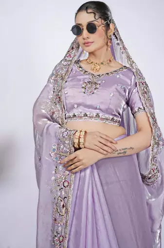 Celebrity inspired purple detailed resham zari floral embroidery saree with unstitched blouse