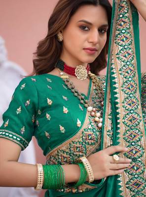 Designer green embroiderd border fandy satin saree with unstitched blouse 4