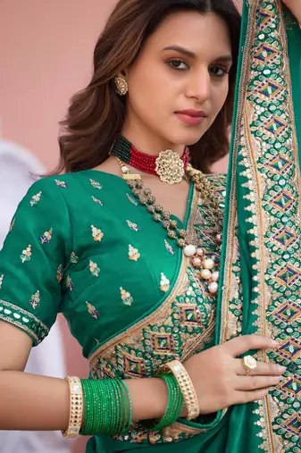 Designer green embroiderd border fandy satin saree with unstitched blouse