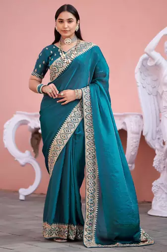 Fashionable teal blue embroidered border fandy satin saree with unstitched blouse