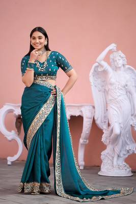 Fashionable teal blue embroidered border fandy satin saree with unstitched blouse 4