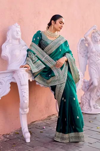 Trendy teal blue zari jaal embroidery heavy border fancy satin saree with unstitched blouse