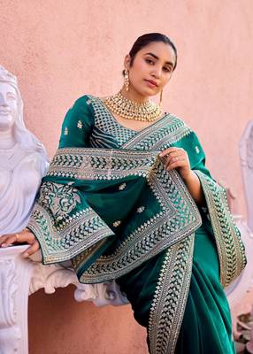 Trendy teal blue zari jaal embroidery heavy border fancy satin saree with unstitched blouse 3