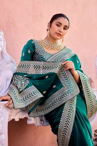 Trendy teal blue zari jaal embroidery heavy border fancy satin saree with unstitched blouse