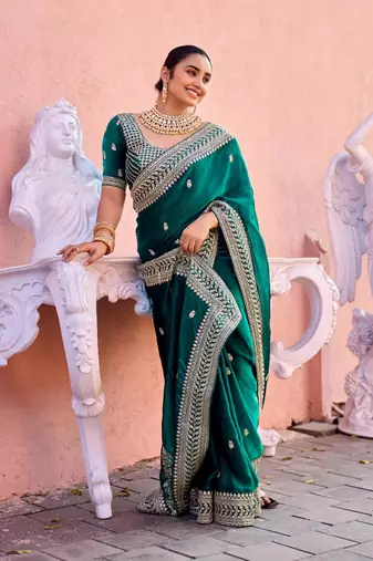 Trendy teal blue zari jaal embroidery heavy border fancy satin saree with unstitched blouse