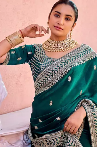 Trendy teal blue zari jaal embroidery heavy border fancy satin saree with unstitched blouse