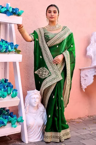 Indian bottle green zari jaal embroidery heavy border fancy satin saree with unstitched blouse