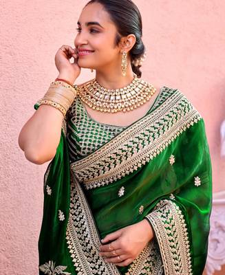 Indian bottle green zari jaal embroidery heavy border fancy satin saree with unstitched blouse 4