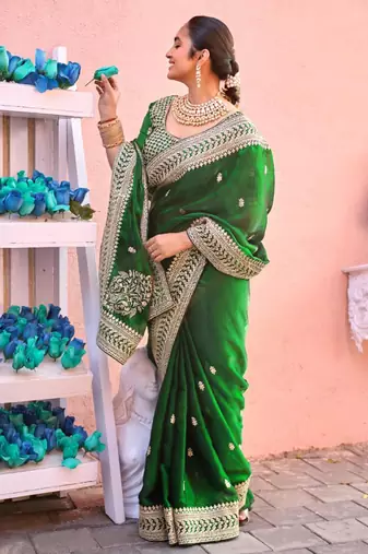 Indian bottle green zari jaal embroidery heavy border fancy satin saree with unstitched blouse