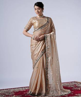 Celebrity inspired cream embroiderd border satin saree with unstitched blouse 1