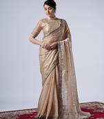 Celebrity inspired cream embroiderd border satin saree with unstitched blouse