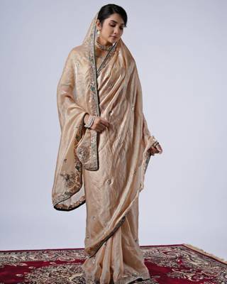 Celebrity inspired cream embroiderd border satin saree with unstitched blouse 2